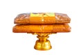 Set of monk`s robes placed on a pedestal on a white background isolate Royalty Free Stock Photo