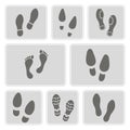 Set of monochrome with footprints and shoeprint icons Royalty Free Stock Photo