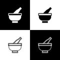 Set Mortar and pestle icon isolated on black and white background. Vector Royalty Free Stock Photo