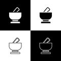 Set Mortar and pestle icon isolated on black and white background. Vector Royalty Free Stock Photo