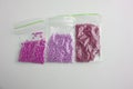 Flat lay Set of multi-colored beads and beads in a mini plastic bag for embroidery needlework