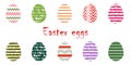 Set of multi-colored Easter eggs with patterns on a white background.