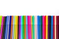 A set of multi-colored felt-tip pens in a row, rainbow on a light white banner background. Drawing markers, pencils, ink, artist Royalty Free Stock Photo