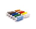 Set of multi-colored spools of cotton thread isolated, with real shadow Royalty Free Stock Photo