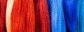 Set of multi-colored threads for embroidery. Background for design, banner format