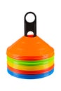 A set of multi-colored traffic cones are stacked, on a white background, restriction of movement Royalty Free Stock Photo