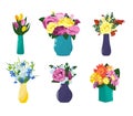 Set of multi-colored vases with different flowers Royalty Free Stock Photo