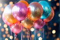 Set of multicolored metallic glossy colors balloons with strings with sparkles on the background. For birthdays, parties