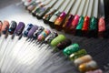 Set of multicolored nail in the Cabinet of nail technicians. Pro