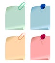 Set of multicolored paper cards attached with paper clip and pushpin to white surface Royalty Free Stock Photo