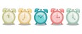 set of multicolored retro alarm clocks