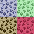 Set of multicolored vector backgrounds with paw print. Duplicate patterns and textures can be used for printing onto fabric, web