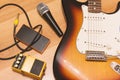 Set of music objects with sunburst electric guitar Royalty Free Stock Photo