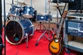 Set of musical instruments ready for rehearsal of music band in modern sound studio Royalty Free Stock Photo