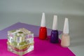 Set of nail polish and perfume for a woman. Royalty Free Stock Photo