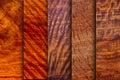 Set of natural real paduk planks with groove joints have a vertical background Royalty Free Stock Photo