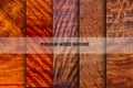 Set of natural real paduk planks with groove joints have a vertical background Royalty Free Stock Photo
