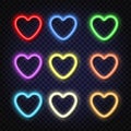 Set neon banners in the shape of a heart of different colors. Shining and glowing effect. Plates with a place for inscriptions Royalty Free Stock Photo