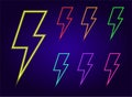 A set of neon lightning bolts. A collection of insulated zippers glowing in the dark with bright colors, yellow, red, blue and