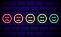 Set of neon smile emoticons isolated on dark brick wall background. Line icons. Happy and unhappy smileys. Emoji set. Colours Royalty Free Stock Photo