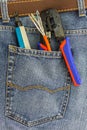 Set of network instruments in a back pocket of jeans Royalty Free Stock Photo
