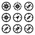 Set of nine black and white compass icons for navigation and direction Royalty Free Stock Photo