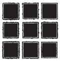 Set of nine grunge square white frames  on a black background Royalty Free Stock Photo