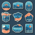 Set of nine mountain travel emblems with grunge texture. Camping outdoor adventure emblems, badges and logo patches