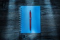 Set of notebooks pen on vintage wooden board Royalty Free Stock Photo