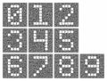 A set of numeric characters. Stylized numbers inside a complex maze