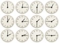 Set of office clocks showing various time isolated on white background Royalty Free Stock Photo