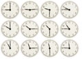 Set of office clocks showing various time isolated on white background Royalty Free Stock Photo