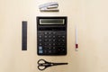 A set of office tools consisting of a calculator, pen, stapler, Royalty Free Stock Photo