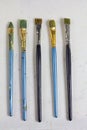 Set of old art brushes. The artist`s tools. Brushes for painting. Royalty Free Stock Photo