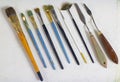 Set of old art brushes and palette knives, palette knots. The artist`s tools. Brushes for painting.art supplies