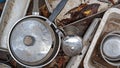 A set of old baking trays jugs pots and pans in a childs outdoor mud kitchen Royalty Free Stock Photo