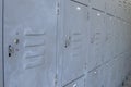 Close up of grey metal lockers for personal storage Royalty Free Stock Photo