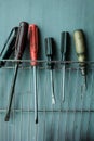 A set of old screwdrivers on a gray background Royalty Free Stock Photo