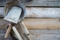 Set of old used masonry tools on a rough wooden surface