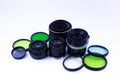 A set of old-vintage lenses and color photo filters on a white background Royalty Free Stock Photo