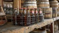 A set of oldfashioned soda bottles in a wire carrier sit atop a wooden cart evoking memories of a bygone era. .