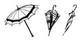 Set of open and closed hand drawn umbrellas. Vector sketch black isolated illustration on white background