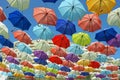 Set of open colored umbrellas on blue sky background Royalty Free Stock Photo