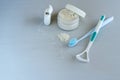 Set of oral care products on gray table Royalty Free Stock Photo