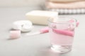 Set of oral care products on light table, closeup. Royalty Free Stock Photo