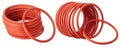Set of orange hydraulic and pneumatic o-ring seals isolated on a white background.