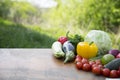Set of organic vegetables and fruits on rustic wooden table and Royalty Free Stock Photo