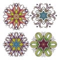 Set of ornate vector mandala symbols. Mehndi lace tattoo. Art Nouveau weave.