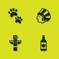 Set Paw print, Beer bottle, Canadian totem pole and Native American Indian icon. Vector Royalty Free Stock Photo