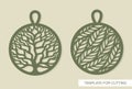 Set of pendants with a tree of life in a round frame and a pattern of leaves. Royalty Free Stock Photo